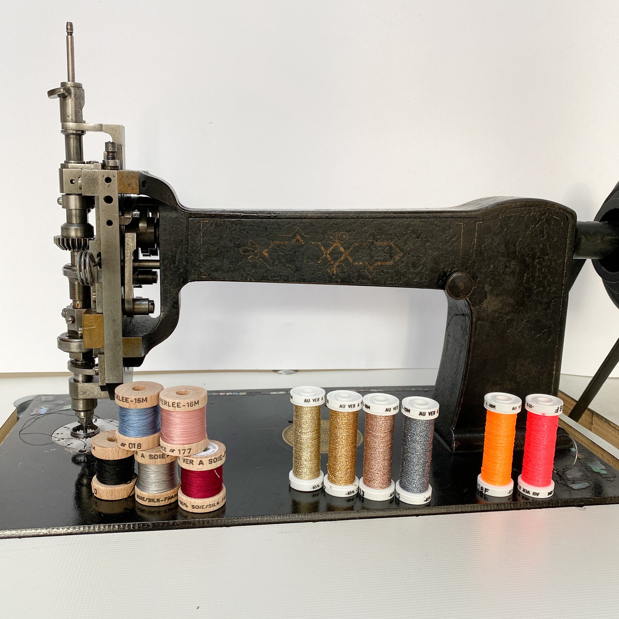 Broderie sur lange, couverture ou cape de bain